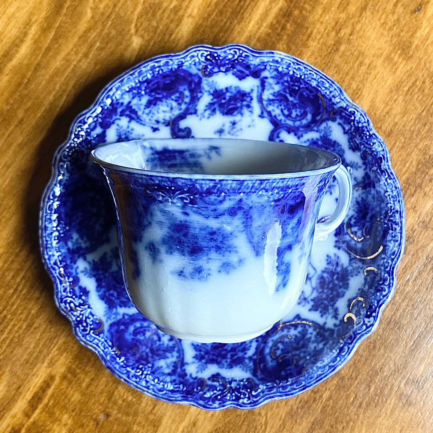 Flow Blue Teacup & Saucer 'Accacia'